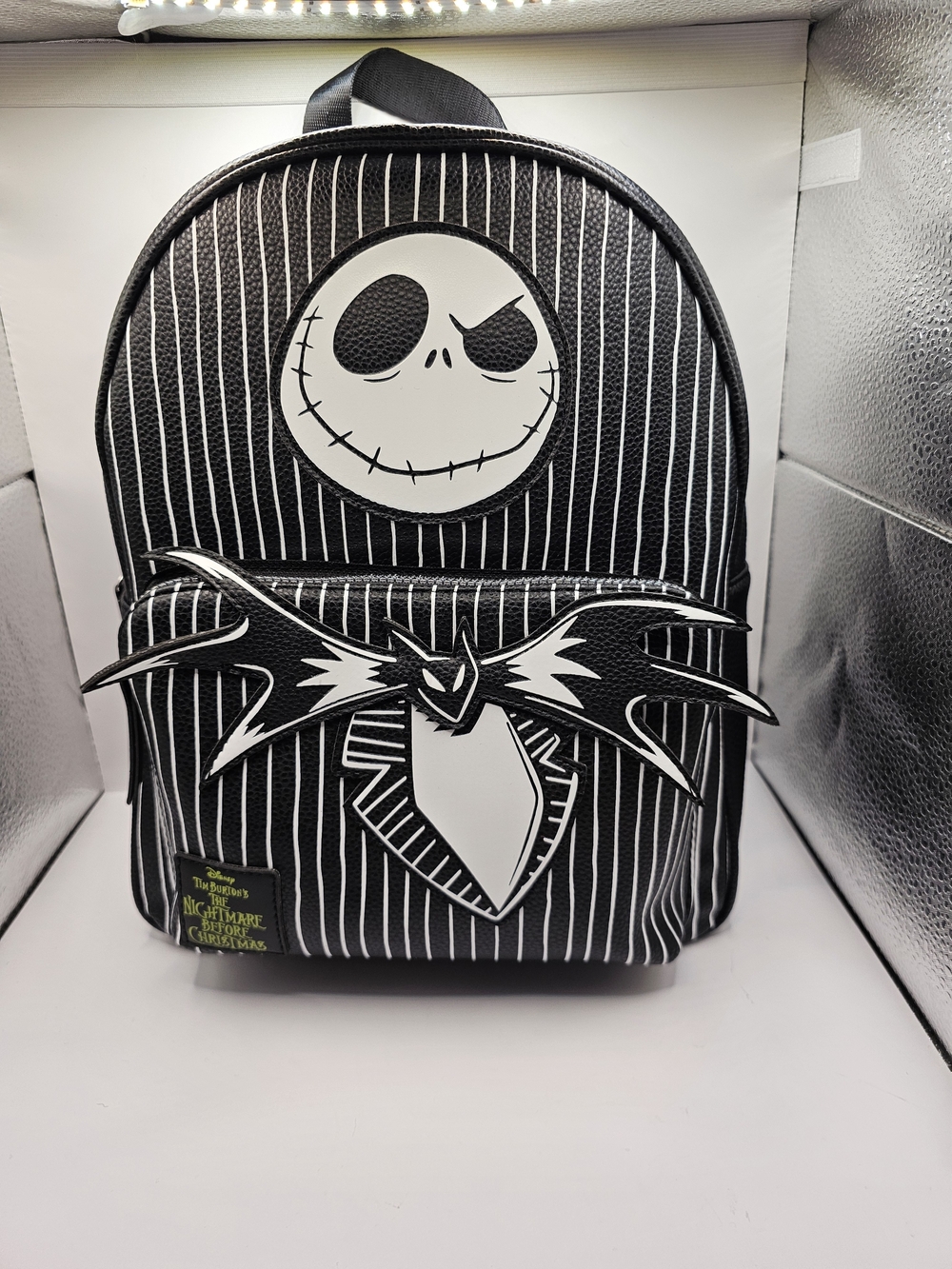 The Disney x Primark Jack Skellington Pinstripe Faux Leather Backpack